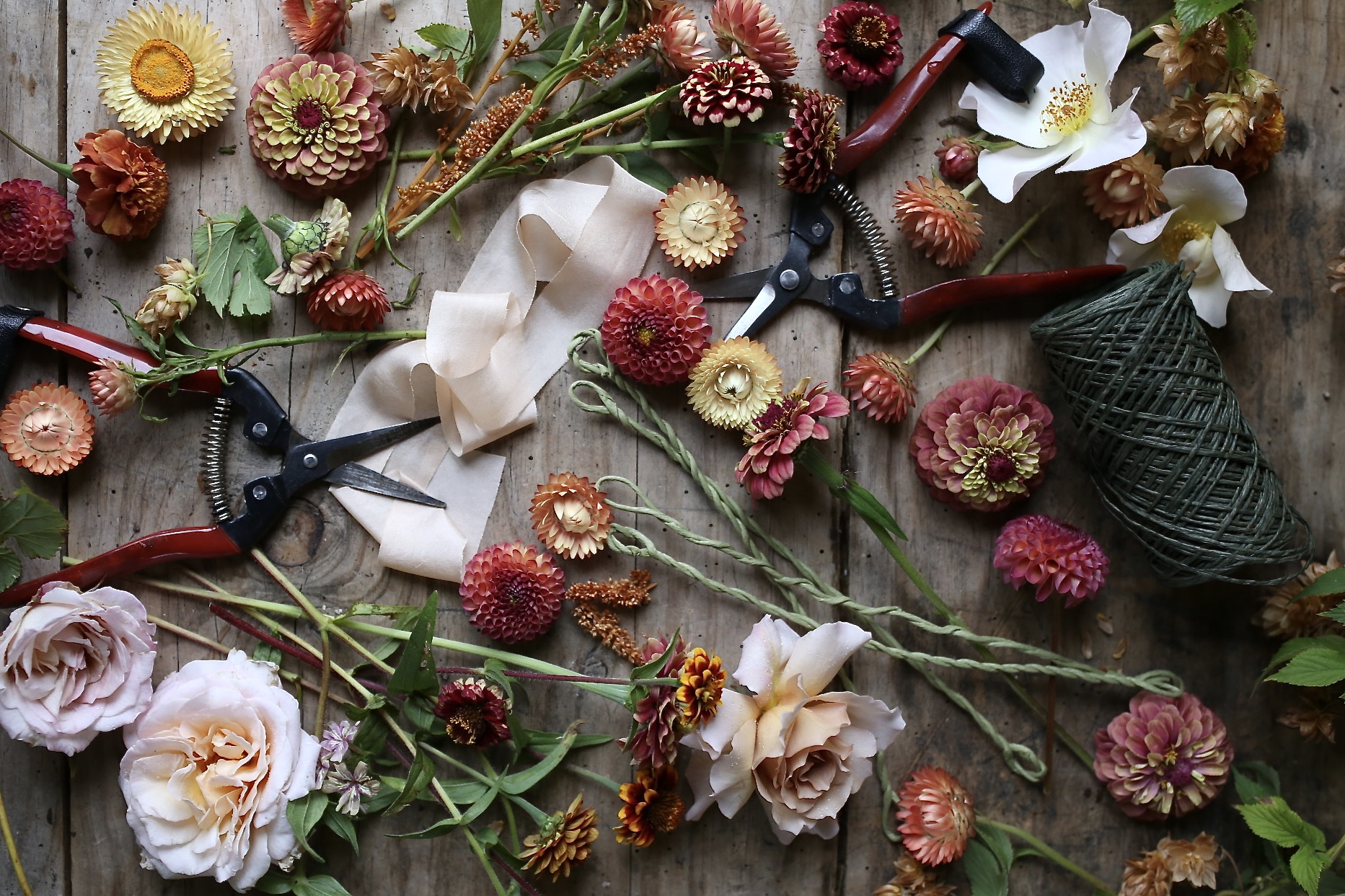 Flowers and garden supplies on a table